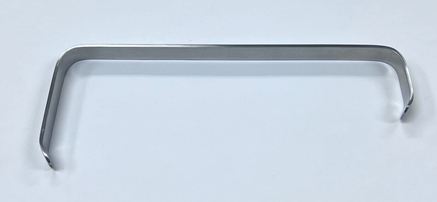 A SOFIELD RETRACTOR on a white surface.