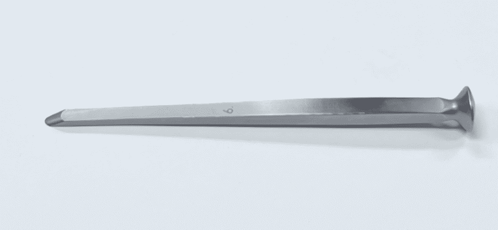 A Silver Color Alexander chisel With White Background