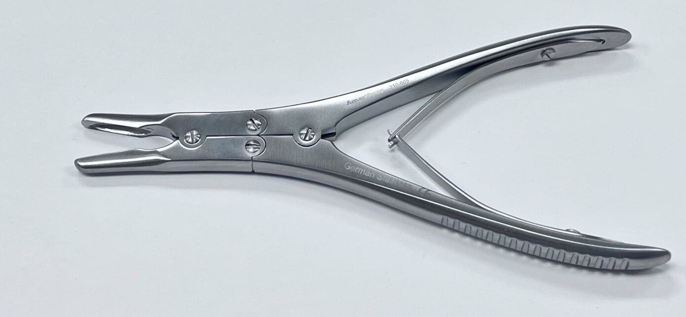 A pair of RUSKIN BONE RONGEUR pliers on a white surface.