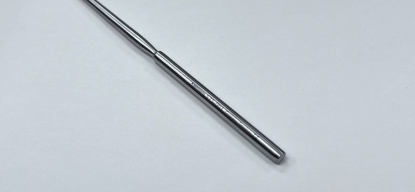 A DANDY NERVE HOOK on a white surface.