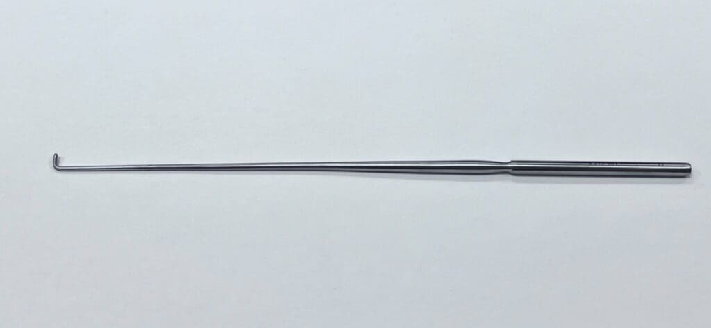 A DANDY NERVE HOOK on a white surface.