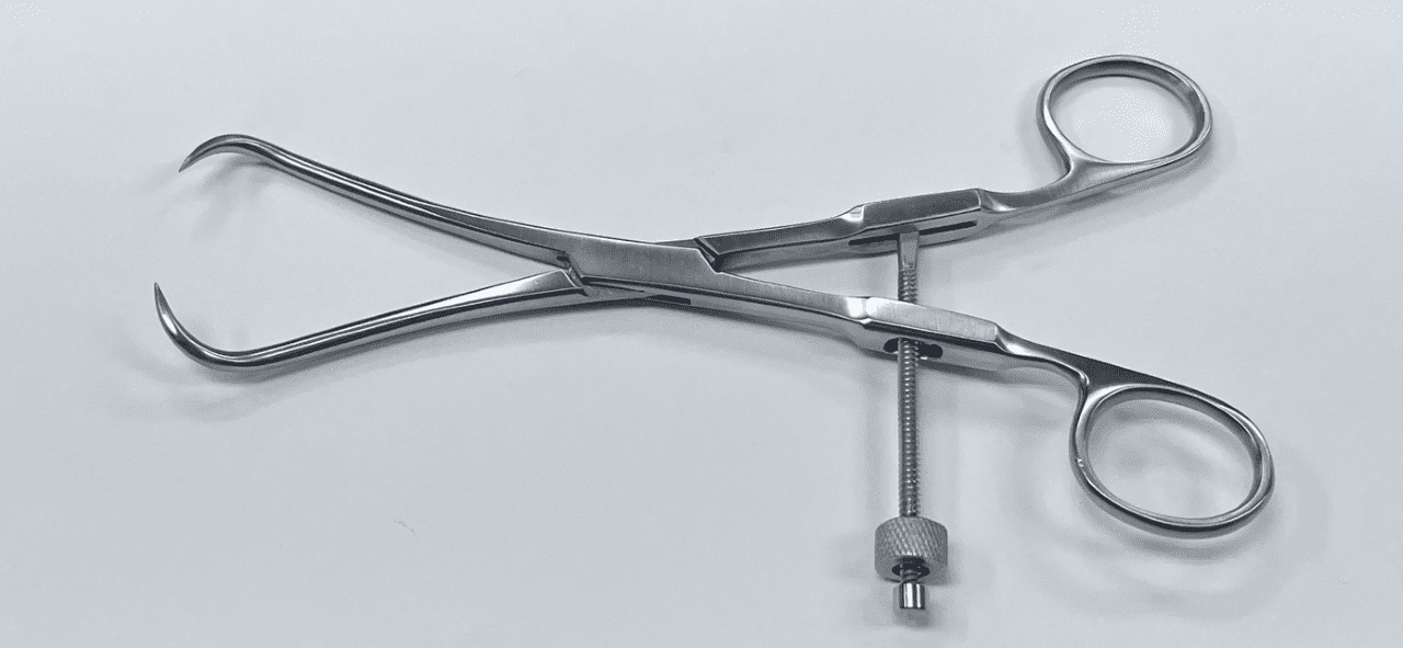 A MEDIAL MALLEOLLAR BONE FRAGMENT CLAMP on a white surface.