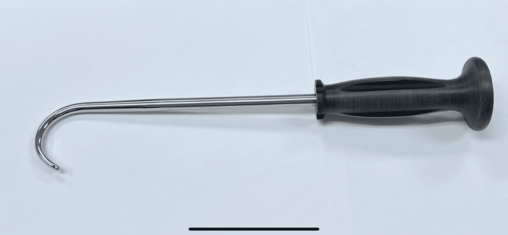A BONE HOOK WITH ERGONOMIC HANDLE on a white surface.