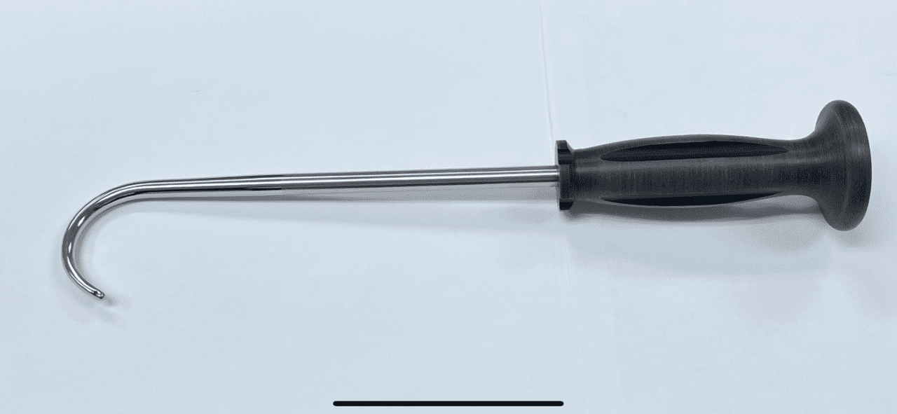 A BONE HOOK WITH ERGONOMIC HANDLE on a white surface.