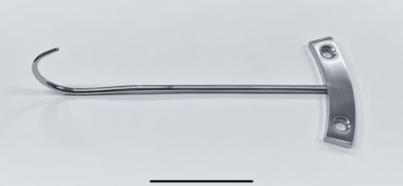 A BONE HOOKS, LOMBARDI TYPE with a hook attached to it.