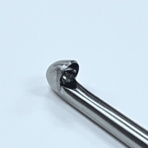 Retrograde curette, sharp with white background