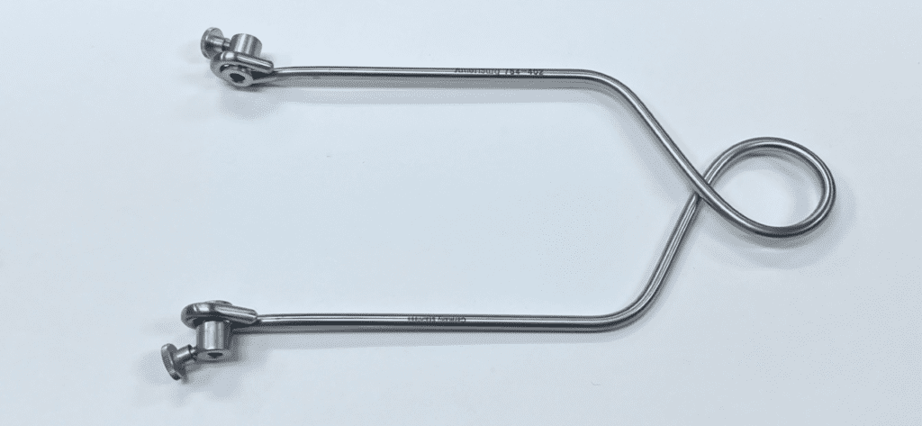 BOEHLER WIRE AND PIN TRACTION BOW hooks on a white surface.