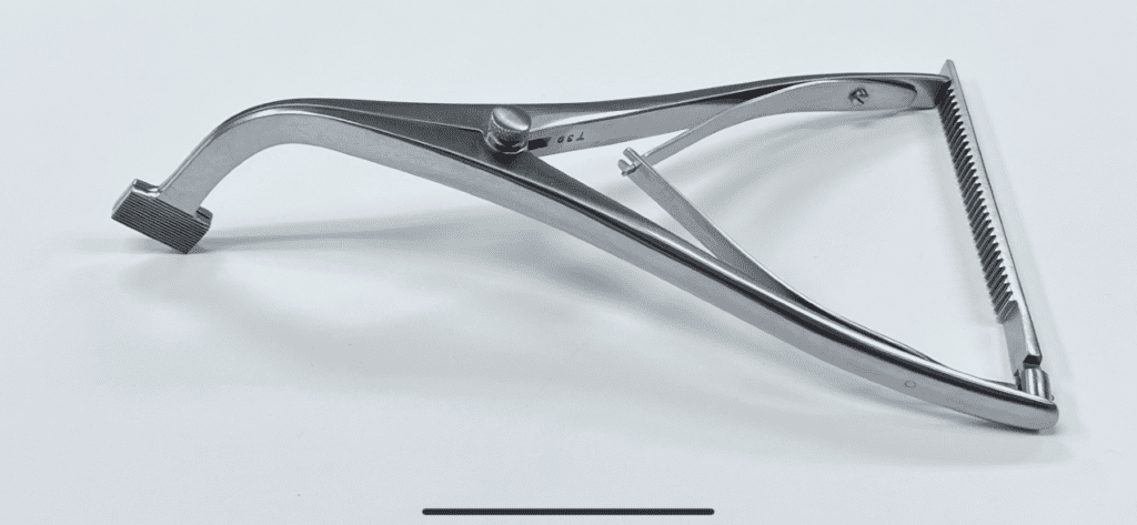 A picture of a Femoral Tibial Spreader, Large, Lombardi Type on a white surface.