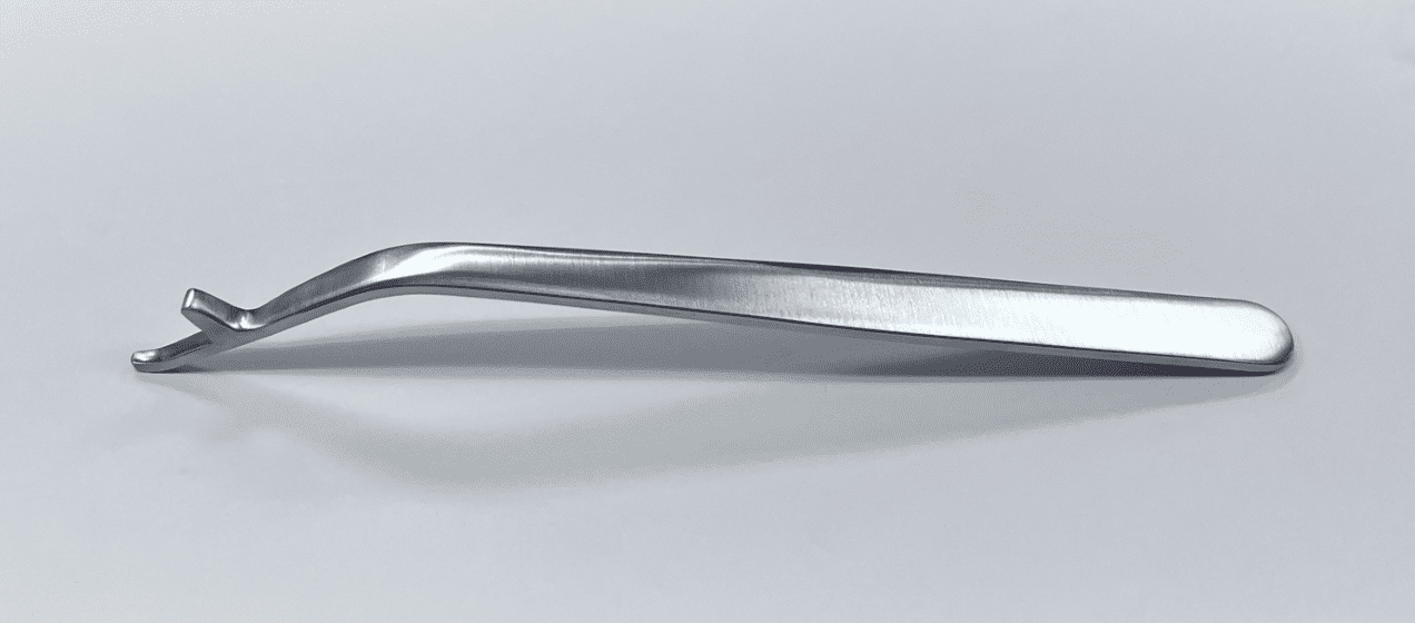 A KNEE RETRACTOR, TIBIAL, CHANDRAN TYPE on a white surface.