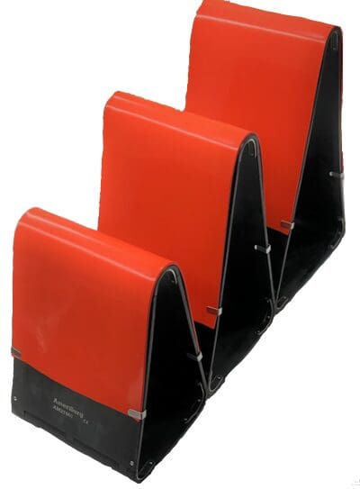 Three red and black ORTHOPEDIC KNEE POSITIONING TRIANGLES on a white background.