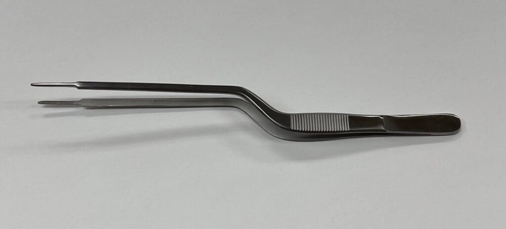 A pair of GERALD DRESSING FORCEP, BAYONET dressing forceps on a white surface.