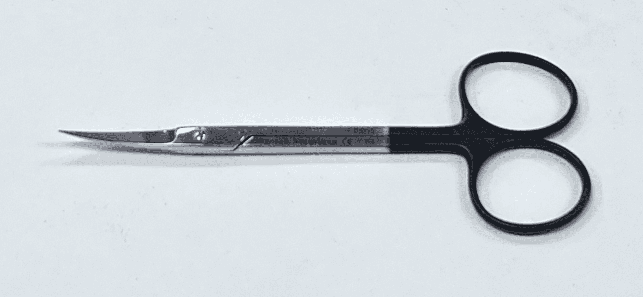 A pair of RAZOR IRIS SCISSORS on a white surface.