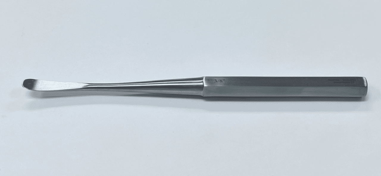 A COBB SPINAL ELEVATOR, HEX HANDLE with a handle on a white surface.