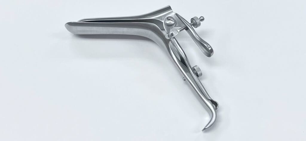 A WEISMAN-GRAVES VAGINAL SPECULUM, RIGHT SIDE OPENING handle on a white surface.
