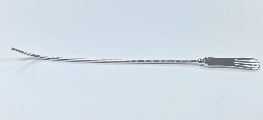 Simpson Uterine Curette on a White Background