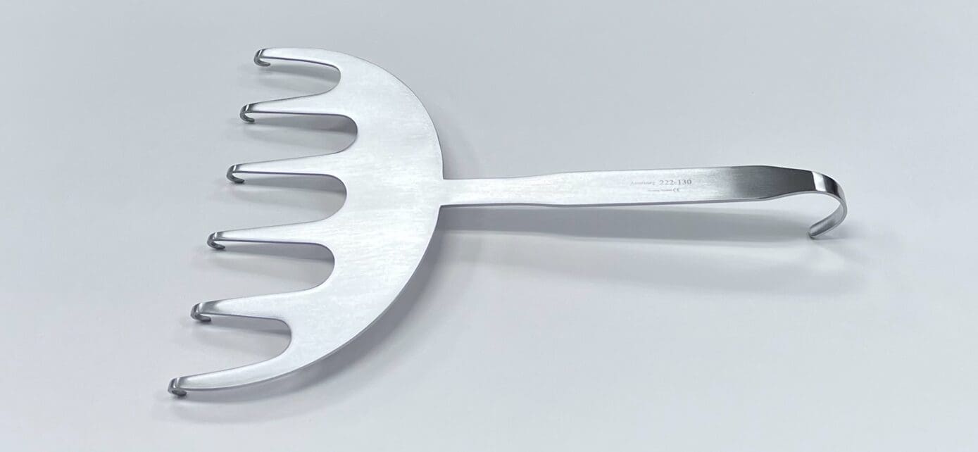 A YANCOSKIE ABDOMINAL RETRACTOR utensil holder on a white surface.