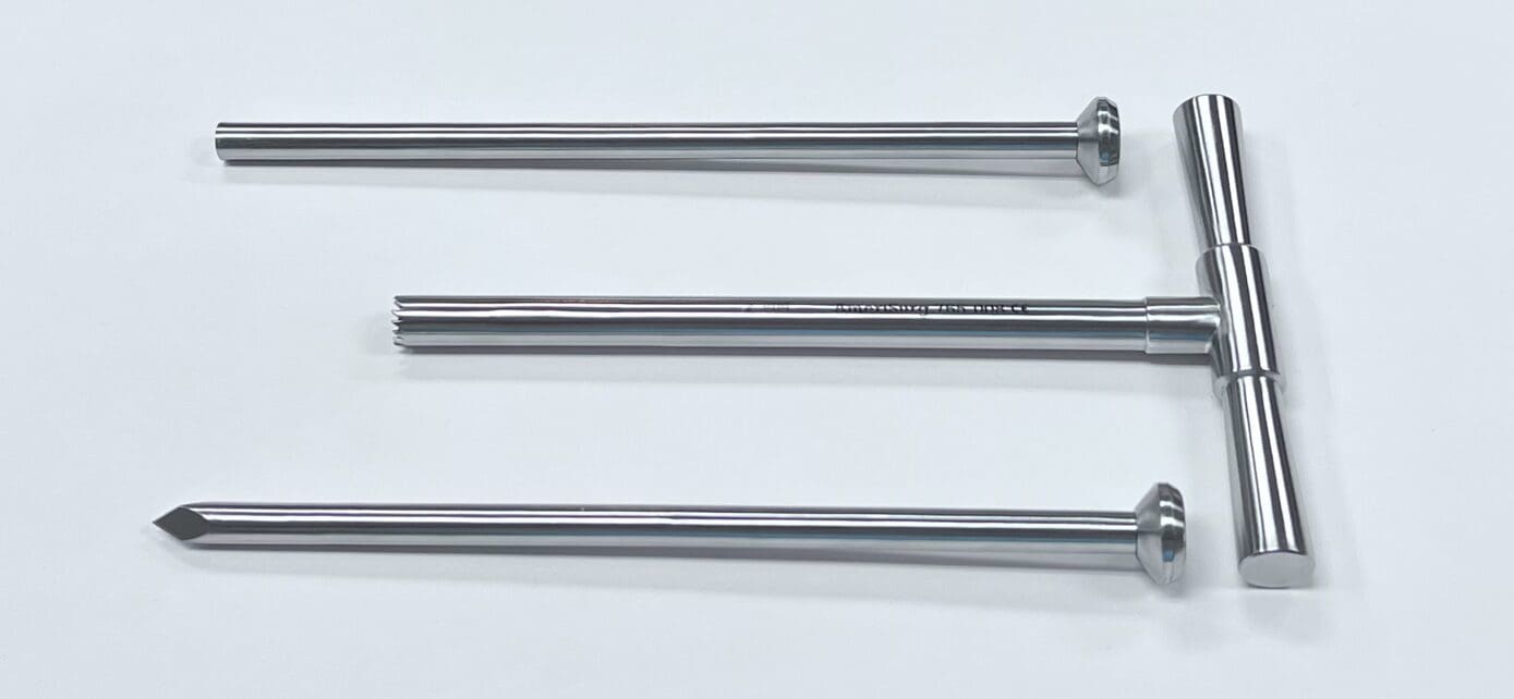 Three BONE BIOPSY KIT, 10MM on a white surface.