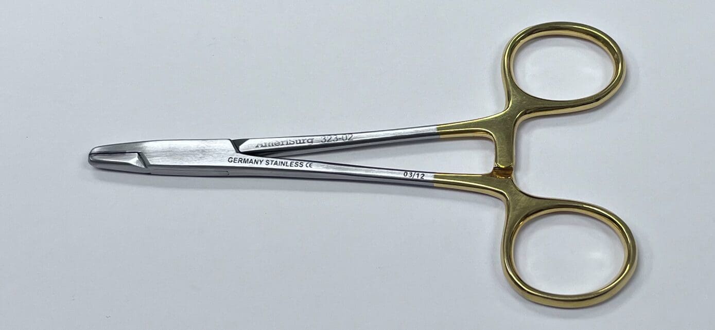 A TC RUBIO WIRE TWISTER on a white surface.