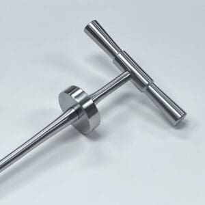 A MORELAND TYPE CEMENT TAP EXTRACTOR on a white surface.