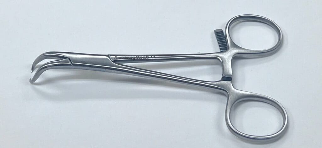 A pair of STAGBEETLE BONE REDUCTION FORCEPS on a white surface.