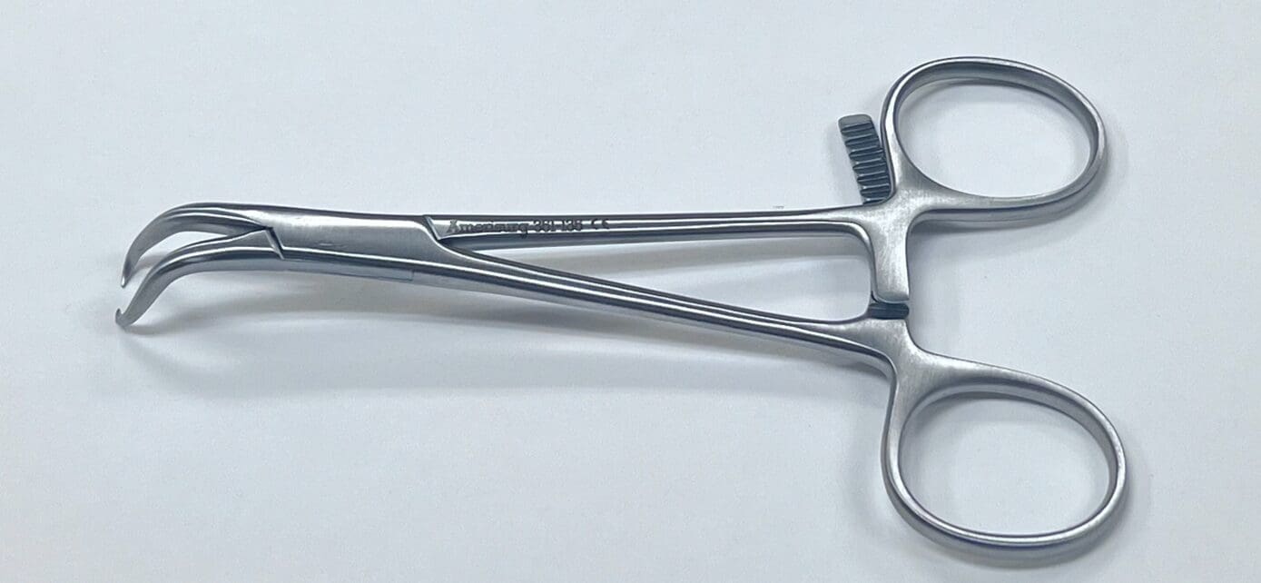 A pair of STAGBEETLE BONE REDUCTION FORCEPS on a white surface.