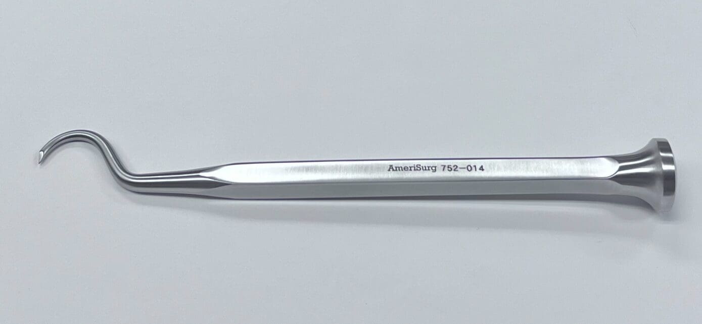 A stainless steel SHOULDER PERCUSSION AWL with a hook on it.